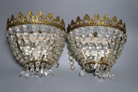 A set of four brass and glass lustre hung wall lights, 24cm wide
